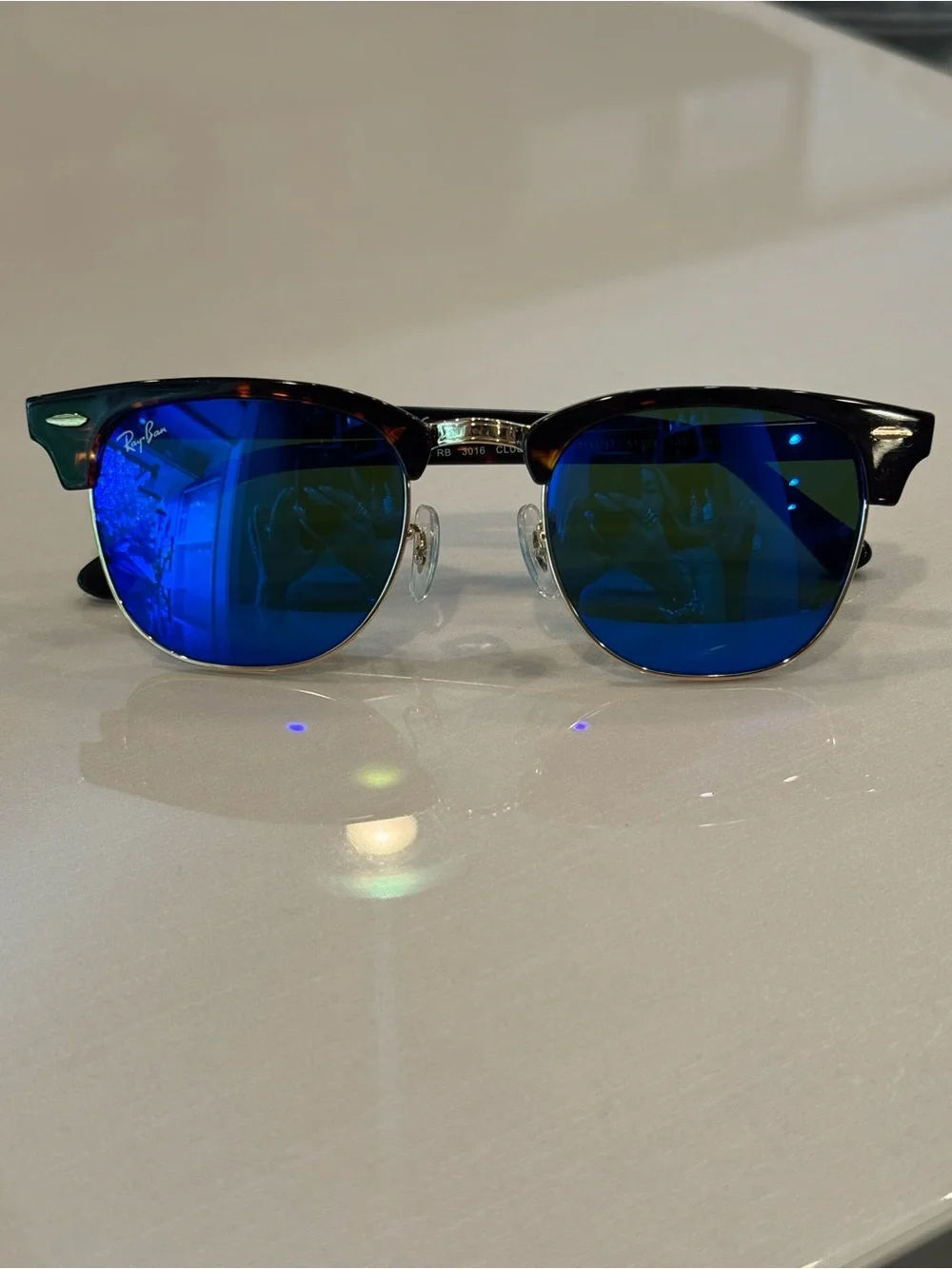 Ray-Ban Tortoiseshell Clubmaster Sunglasses with Blue Mirrored Lenses
